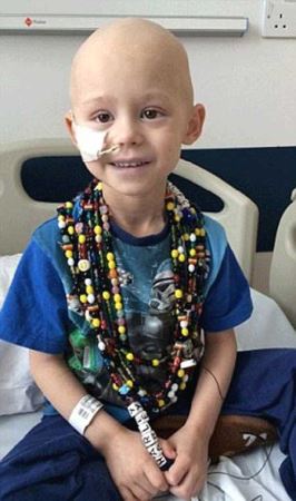 پسر کوچولویی که مهلک ترین سرطان دنیا را شکست (عکس)