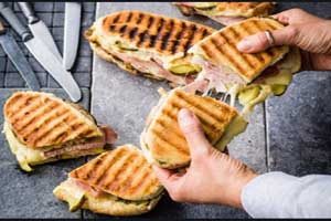 طرز تهیه ساندویچ کوبایی غذای مورد علاقه خواننده مشهور (عکس