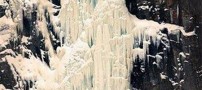 عکس های صعودی باور نکردنی مردی از آبشار یخ زده