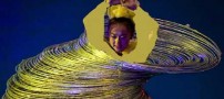 رکورد دختری چینی با رقص با 105 هولاهوب +تصاویر