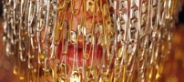 هنرنمایی احمقانه زن با هزاران سنجاق قفلی+عکس