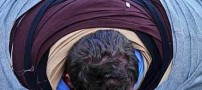 ثبت رکورد خنده دار با پوشیدن 245 تی شرت +عکس