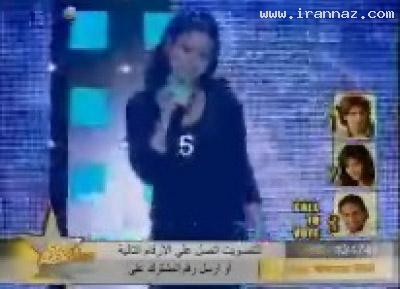 عکسهایی از سوتی خواننده زن هنگام اجرای کنسرت